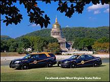 WVSP cruisers in front of the WV State Capital building.